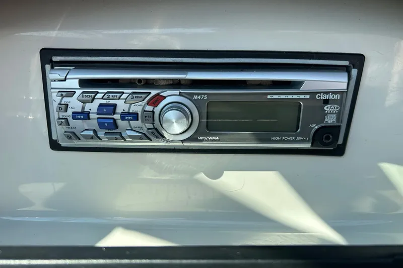 Slide: The Image of Clarion marine stereo in 2008 Searay 205 SPORT boat dashboard. - 27