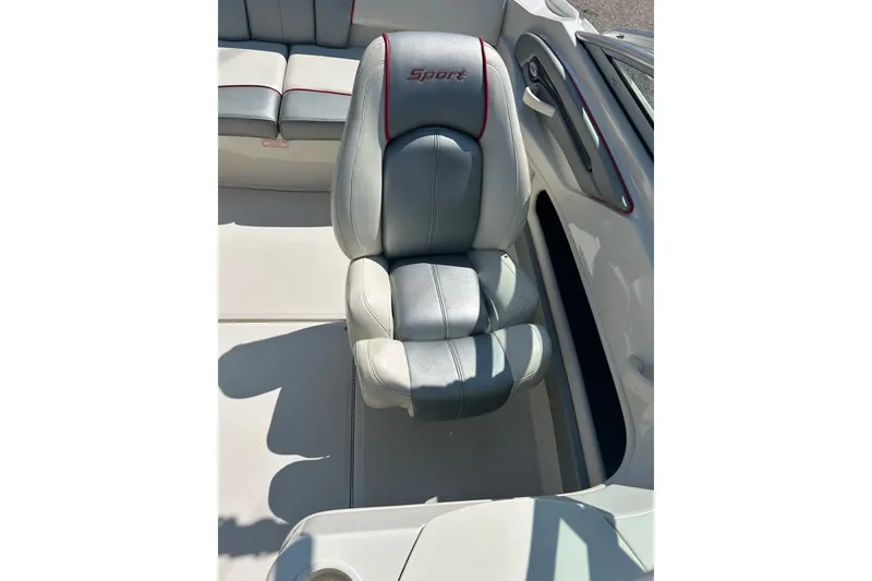 Slide: The Image of 2008 Searay 205 SPORT boat interior with gray and red-trimmed seating. - 30