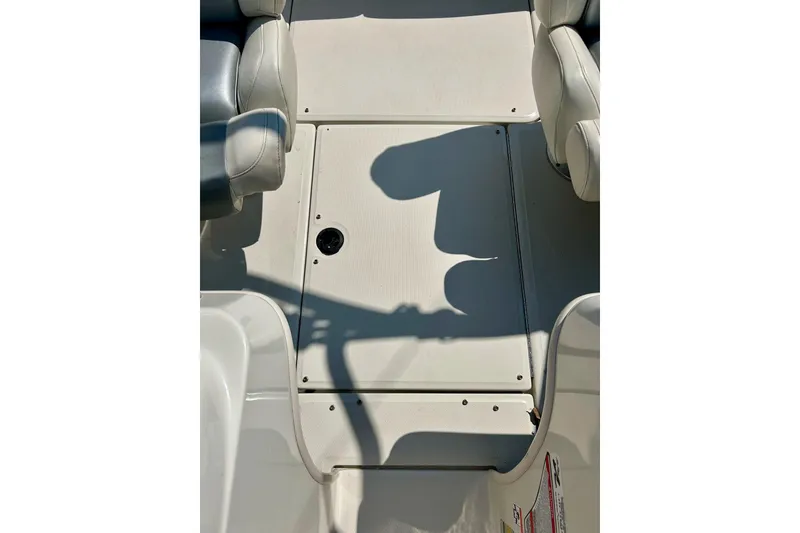 Slide: The Image of 2008 Searay 205 SPORT boat interior with beige seating and floor panel. - 31