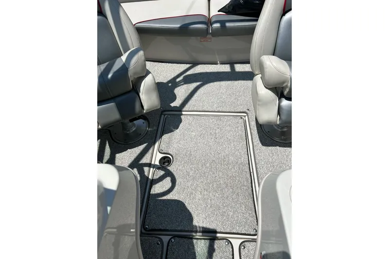 Slide: The Image of Interior of 2008 Searay 205 SPORT boat with gray seating and carpeted floor. - 40