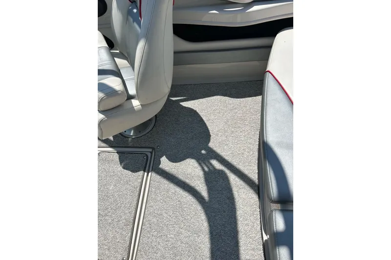 Slide: The Image of Interior of 2008 Searay 205 SPORT boat with gray carpet and seating. - 43