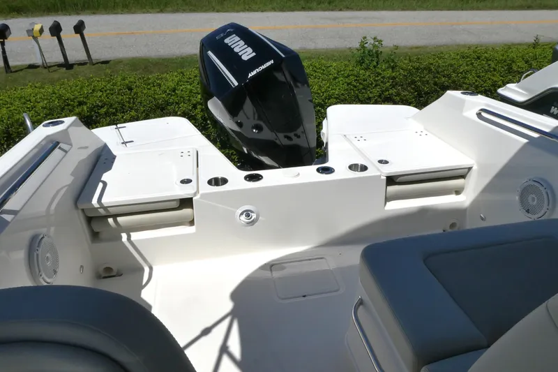 Slide: The Image of 2025 Boston Whaler 210 Vantage boat interior with Mercury outboard motor. - 9