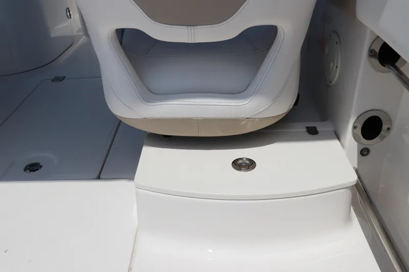 Slide: The Image of 2019 Robalo R207 Dual Console boat seat and deck detail. - 17