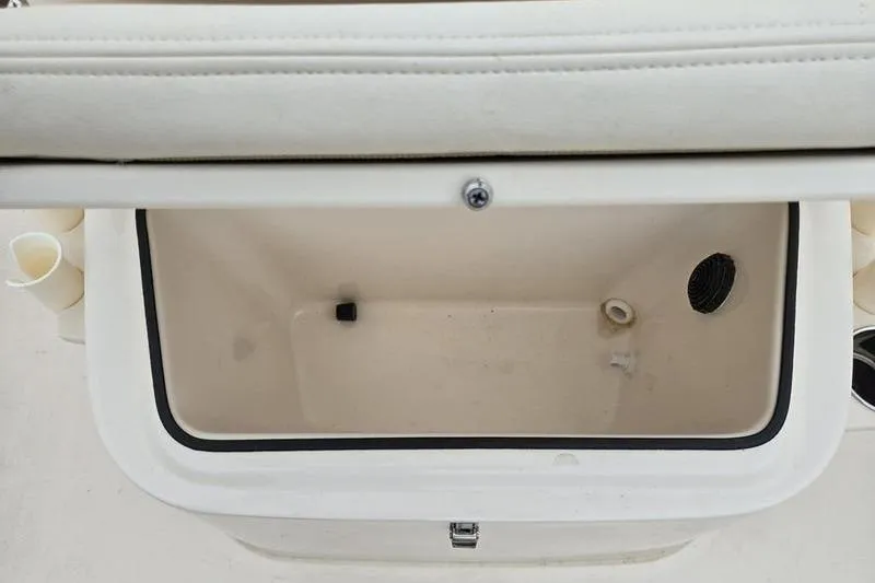 Slide: The Image of 2024 Grady-White Fisherman 180 boat storage compartment, open and empty. - 10