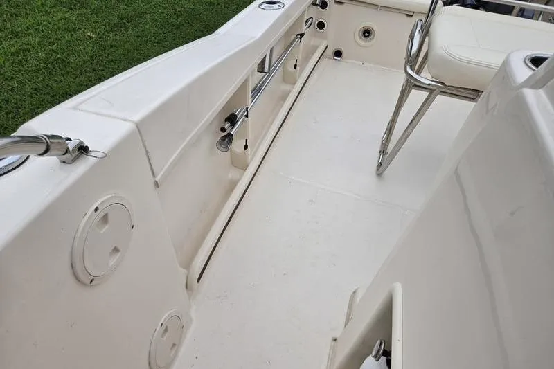 Slide: The Image of 2024 Grady-White Fisherman 180 boat interior with seating and rod holders. - 14