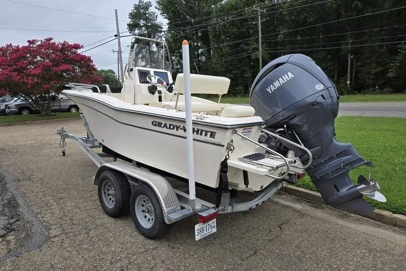 Slide: The Image of 2024 Grady-White Fisherman 180 boat on trailer with Yamaha outboard motor. - 4