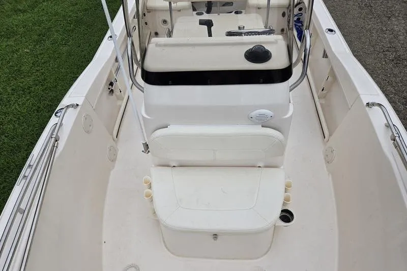 Slide: The Image of 2024 Grady-White Fisherman 180 boat interior, featuring seating and console layout. - 5