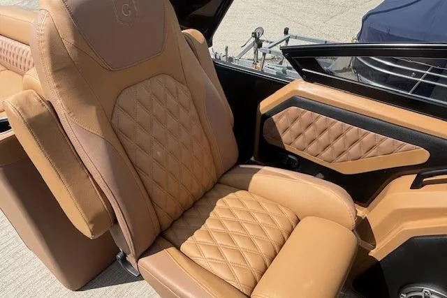 Slide: The Image of Luxurious tan leather seat in 2025 Godfrey San Pan SP2700SBW boat. - 21