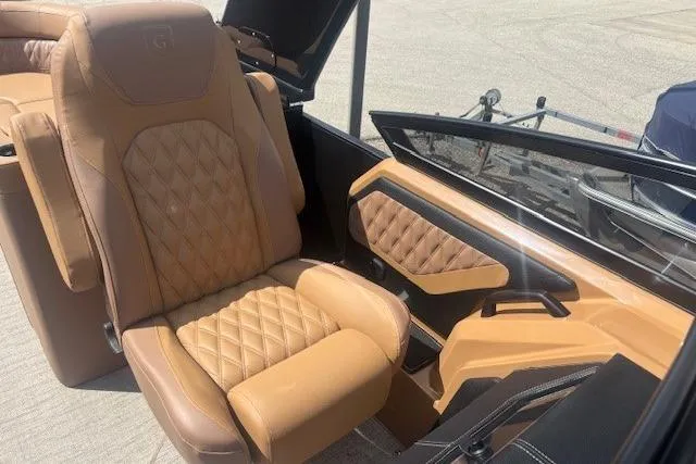 Slide: The Image of Luxurious tan leather seating in 2025 Godfrey San Pan SP2700SBW boat interior. - 31