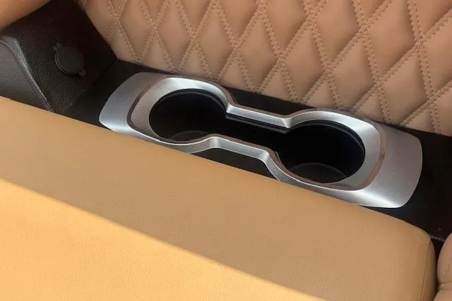 Slide: The Image of Luxury car interior with quilted leather and dual cup holders, Godfrey San Pan SP2700SBW 2025. - 33