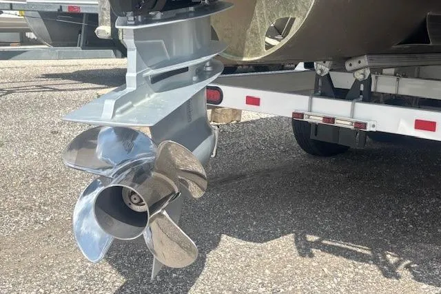 Slide: The Image of Propeller of 2025 Godfrey San Pan SP2700SBW boat on trailer, close-up view. - 44