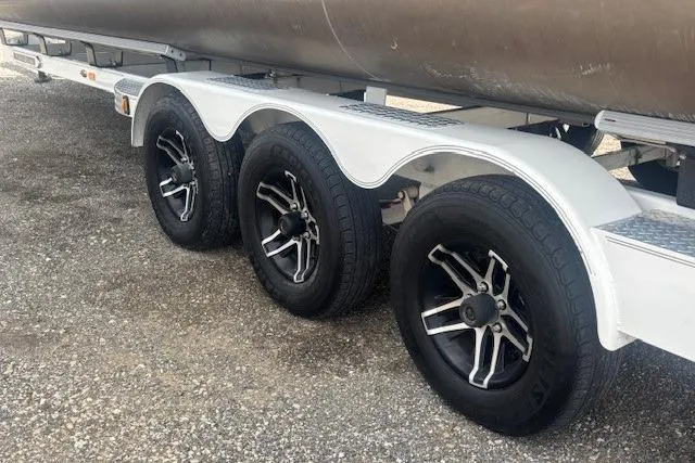 Slide: The Image of Triple-axle trailer with black alloy wheels, Godfrey San Pan SP2700SBW, 2025 model. - 48