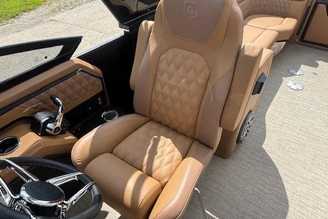 Slide: The Image of Luxurious interior of 2025 Godfrey SAN PAN SP 2700 SBW with tan leather seating. - 55