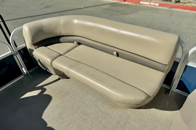 Slide: The Image of 2021 Sun Tracker Party Barge 18 DLX, beige seating, outdoor setting. - 10