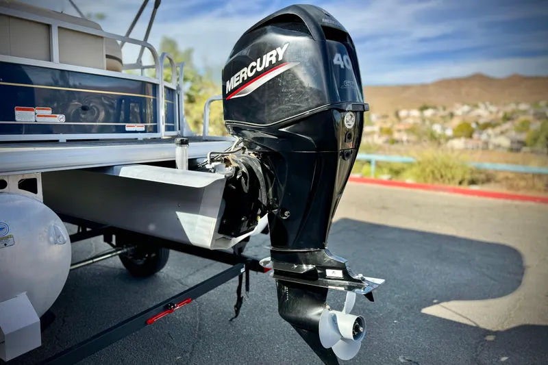 Slide: The Image of 2021 Sun Tracker Party Barge 18 DLX with Mercury 40 outboard motor. - 5