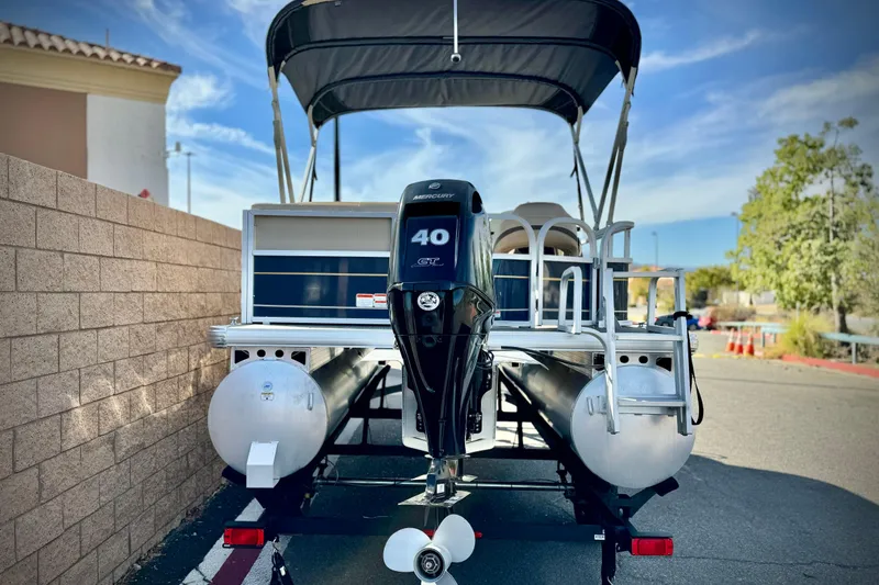 Slide: The Image of 2021 Sun Tracker Party Barge 18 DLX pontoon boat with Mercury 40 HP engine. - 6