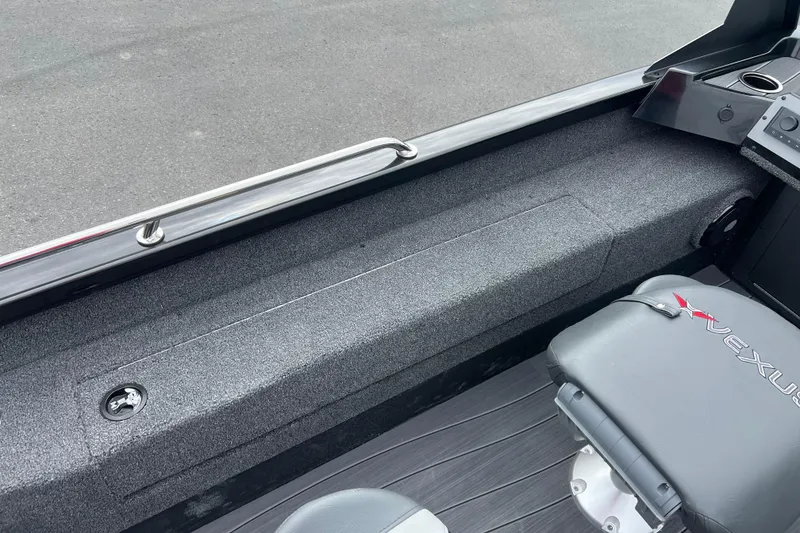 Slide: The Image of 2025 Vexus ADX190 boat interior with gray seating and sleek design. - 11