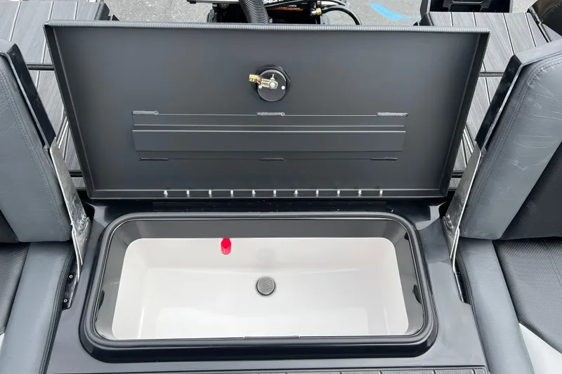 Slide: The Image of Open storage compartment in 2025 Vexus ADX190 boat, showcasing interior design and functionality. - 15