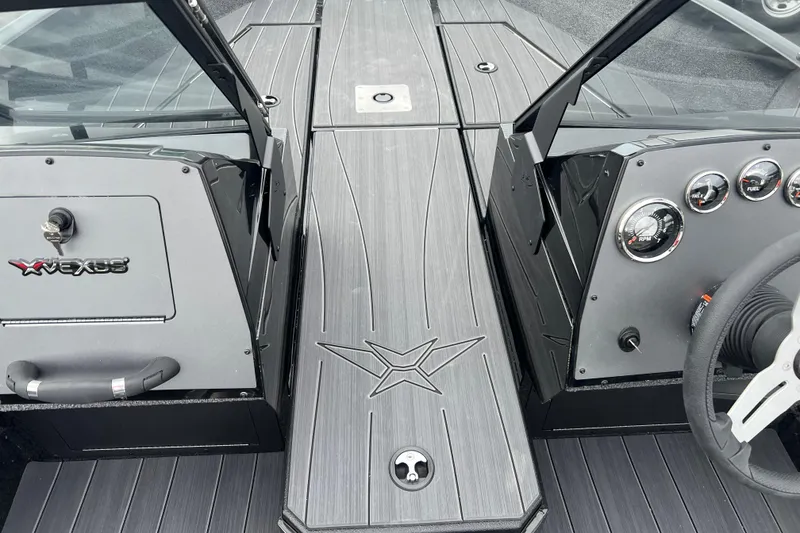 Slide: The Image of 2025 Vexus ADX190 boat dashboard with sleek design and modern gauges. - 4