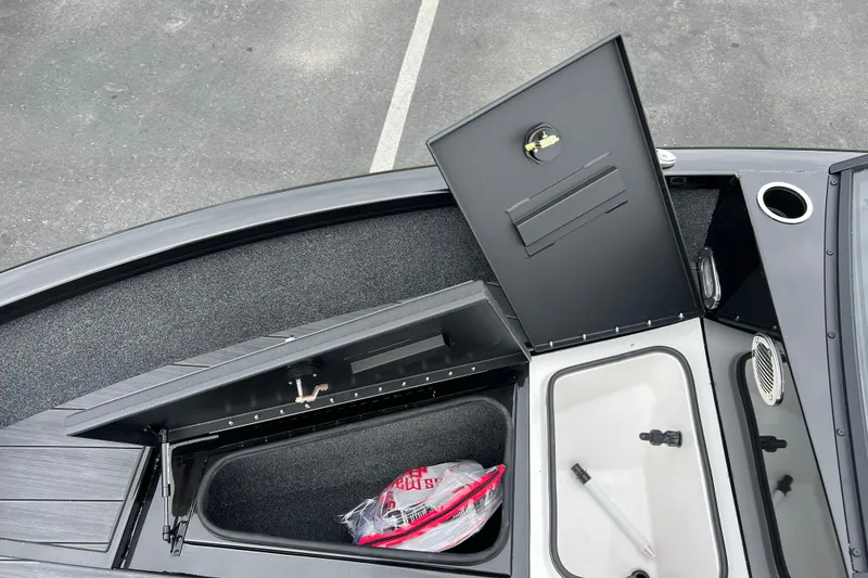Slide: The Image of 2025 Vexus ADX190 boat storage compartments and livewell, showcasing interior design and functionality. - 9