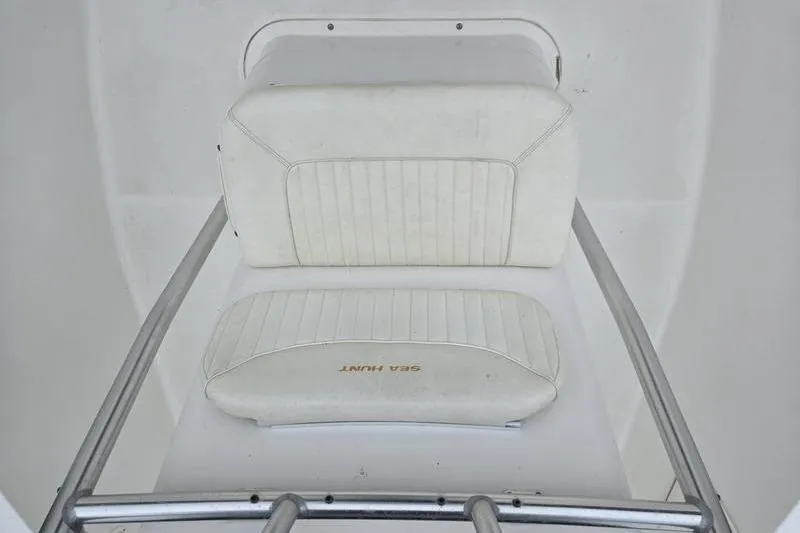 Slide: The Image of White seating on 2007 Sea Hunt Triton 220 boat, featuring sleek design and comfort. - 7