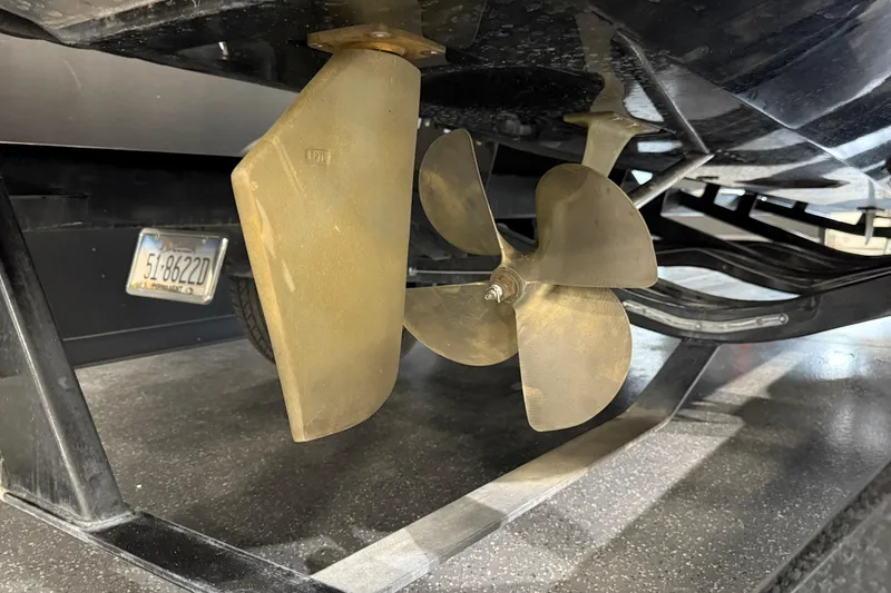 Slide: The Image of 2021 Centurion Ri265 boat propeller and rudder detail, showcasing underwater components. - 6