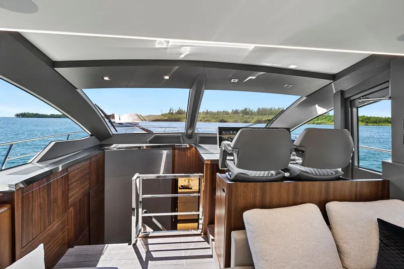 Slide: The Image of Luxurious interior of 2023 Astondoa 66 Flybridge yacht with ocean view. - 22