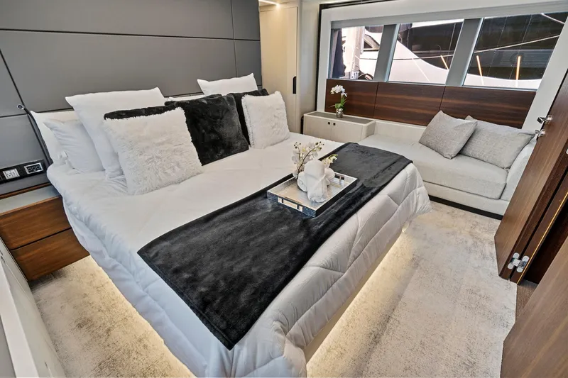 Slide: The Image of Luxurious bedroom in 2023 Astondoa 66 Flybridge yacht with elegant decor and modern furnishings. - 28