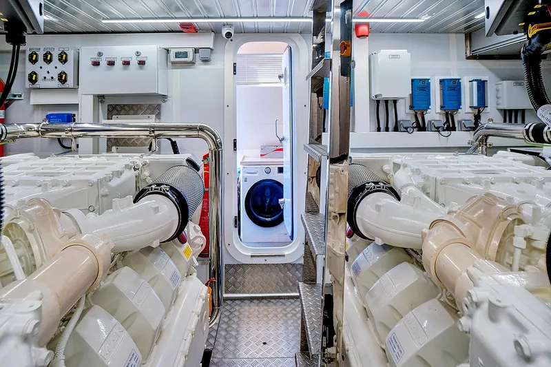 Slide: The Image of Engine room of 2023 Astondoa 66 Flybridge yacht, featuring advanced machinery and equipment. - 36