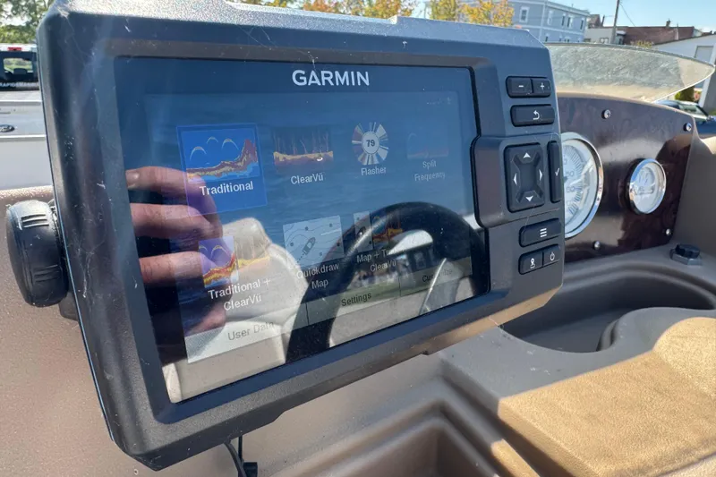 Slide: The Image of Garmin navigation system on 2007 Manitou Aurora boat dashboard, displaying sonar options. - 16