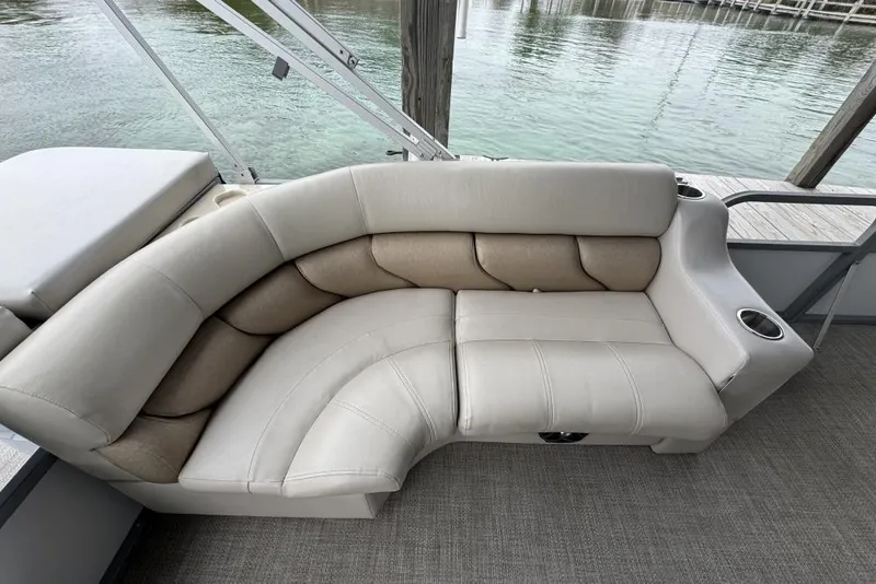 Slide: The Image of 2007 Manitou Aurora boat interior with steering wheel and control panel. - 9