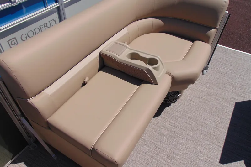 Slide: The Image of Beige seating on 2026 Godfrey EX 1880CX boat with cup holders and sleek design. - 15