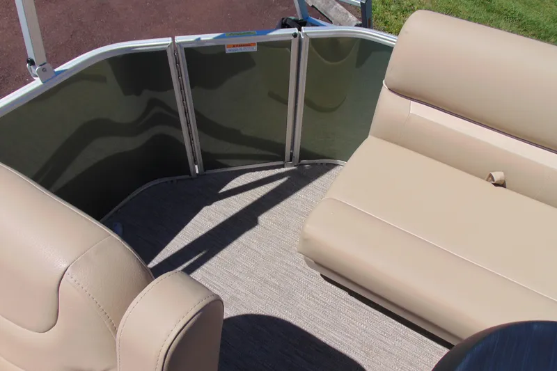 Slide: The Image of Interior of 2026 Godfrey EX 1880CX boat with beige seating and carpet flooring. - 9