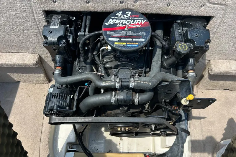 Slide: The Image of Capacity label on 2003 Sea Ray 182 SRX Bow Rider, limits 8 persons or 1100 lbs. - 24