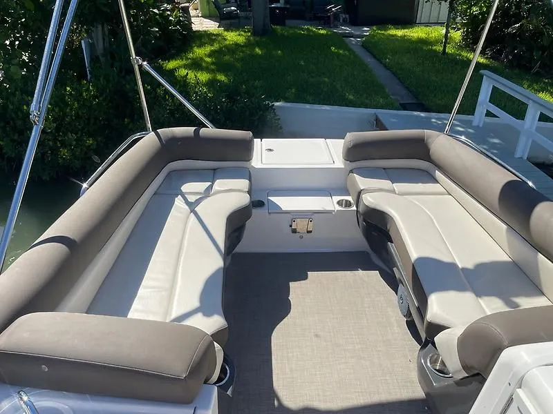 Slide: The Image of 2020 Bayliner Element XR7 boat interior with spacious seating and modern design. - 26