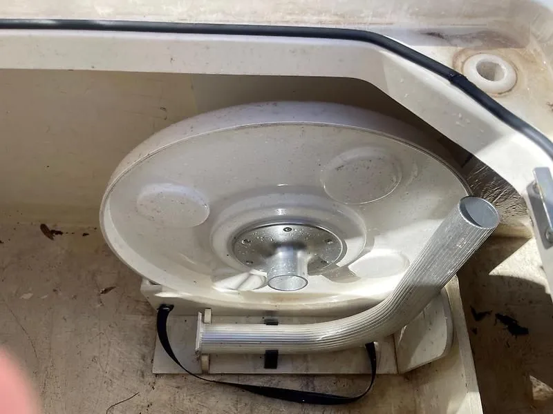 Slide: The Image of 2020 Bayliner Element XR7 boat component, featuring a circular mechanism and metal handle. - 30