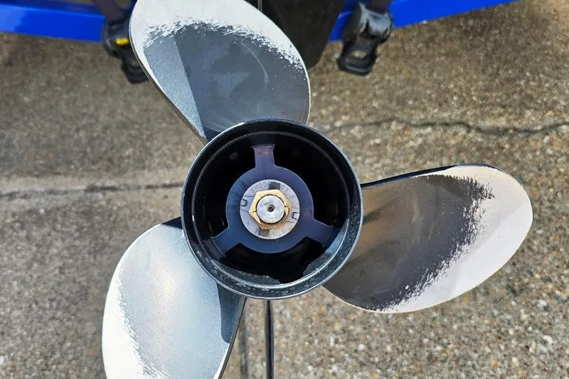 Slide: The Image of 2013 Glastron GLS 195 BR boat propeller on concrete surface. - 10