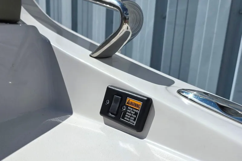 Slide: The Image of 2013 Glastron GLS 195 BR boat switch panel with warning label. - 21