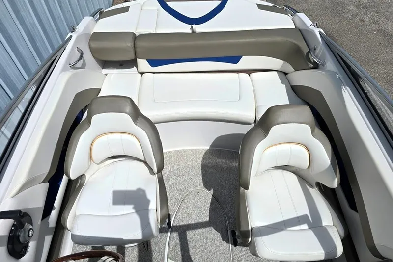 Slide: The Image of 2013 Glastron GLS 195 BR boat interior with white and gray seating. - 6