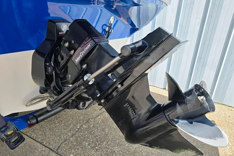 Slide: The Image of 2013 Glastron GLS 195 BR boat with MerCruiser outboard motor, close-up view. - 9