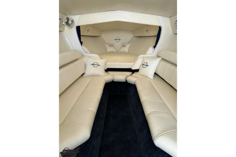 Slide: The Image of Luxurious interior of a 2006 Fountain 47 Lightning boat with cream leather seating. - 36