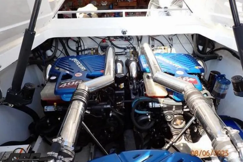Slide: The Image of Engine compartment of a 2006 Fountain 47 Lightning boat with dual Mercury 496 engines. - 50