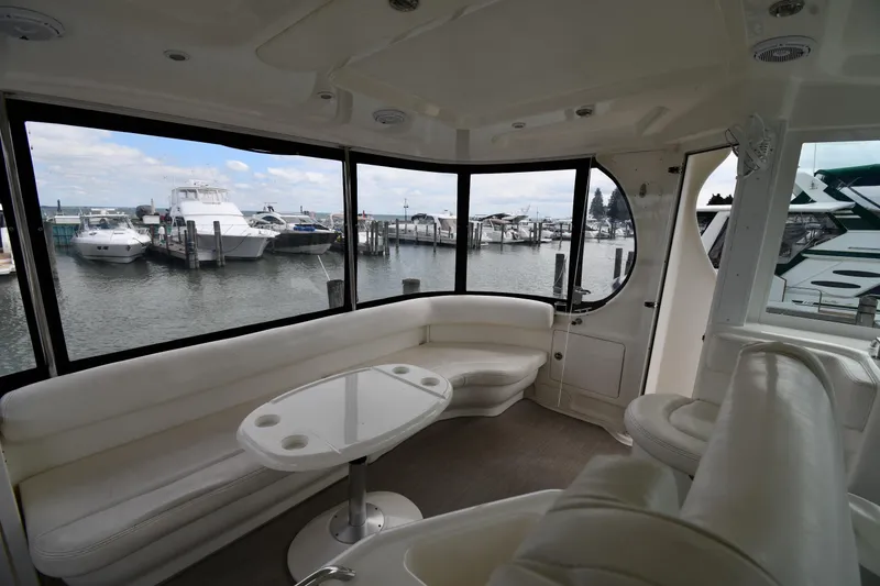 Slide: The Image of Interior of 2005 Sea Ray 390 Motor Yacht with marina view through large windows. - 21