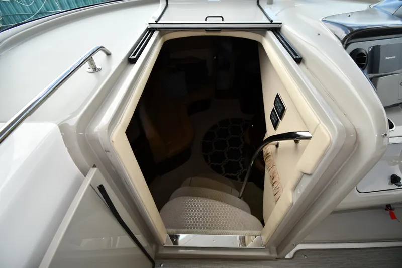 Slide: The Image of 2005 Sea Ray 390 Motor Yacht cabin entrance with interior view. - 24