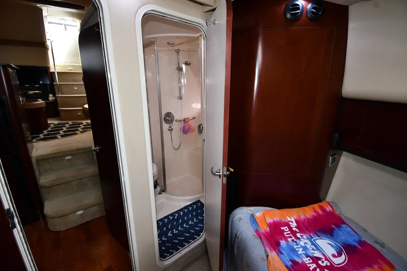 Slide: The Image of 2005 Sea Ray 390 Motor Yacht interior with shower and cozy cabin. - 32