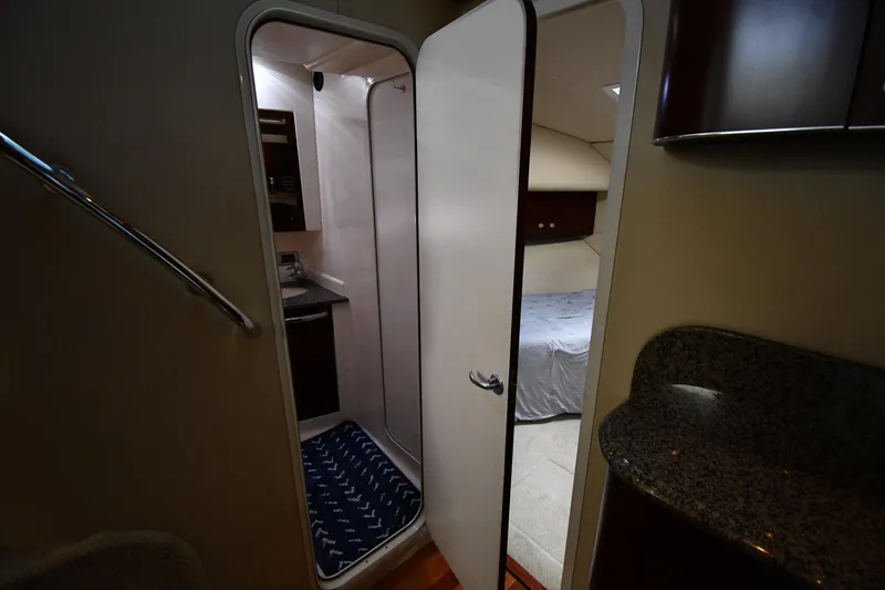 Slide: The Image of Interior of 2005 Sea Ray 390 Motor Yacht with bathroom and bedroom view. - 33