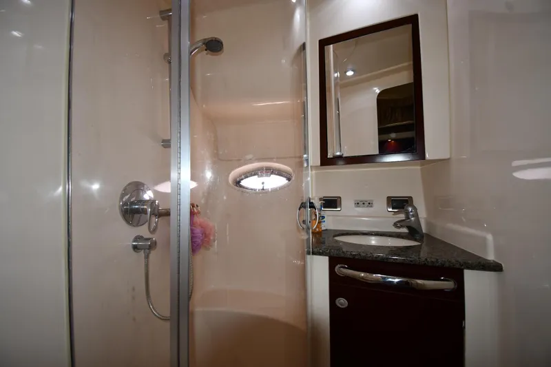 Slide: The Image of Luxurious bathroom in 2005 Sea Ray 390 Motor Yacht with shower and vanity. - 34