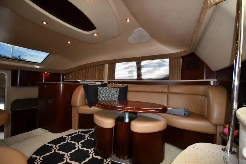 Slide: The Image of Luxurious interior of 2005 Sea Ray 390 Motor Yacht with leather seating and elegant decor. - 36