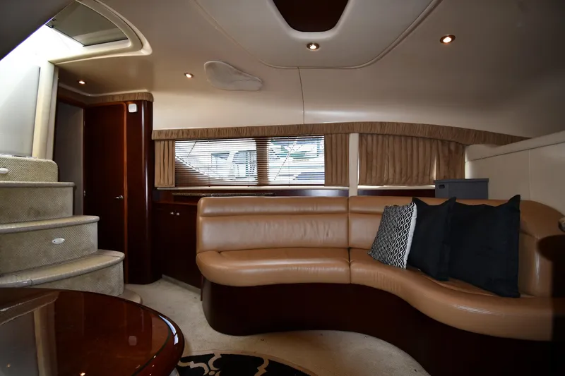Slide: The Image of Luxurious interior of 2005 Sea Ray 390 Motor Yacht with leather seating and elegant design. - 38