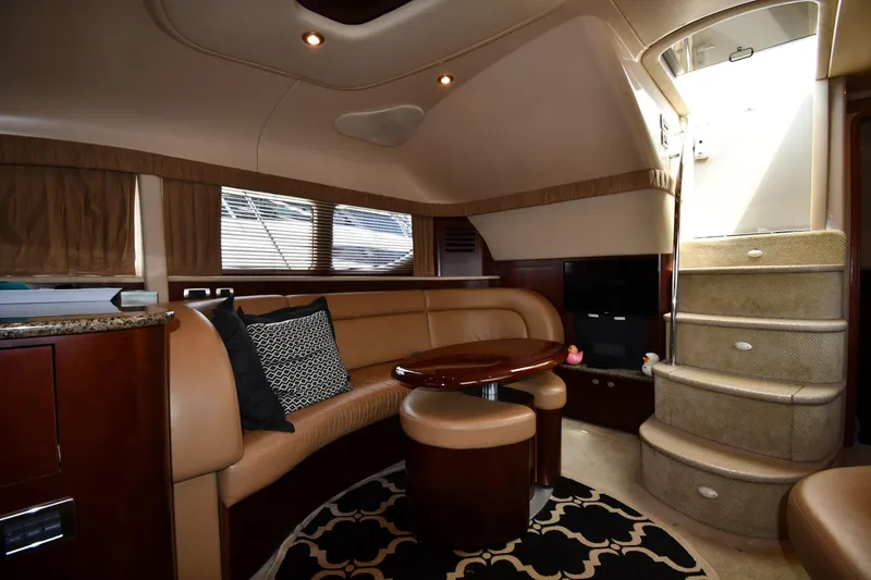 Slide: The Image of Luxurious interior of 2005 Sea Ray 390 Motor Yacht with elegant seating and modern design. - 39